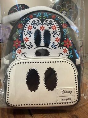 Loungefly Disney Minnie Sugar Skull Mini Backpack in Black, White & Multicolor
